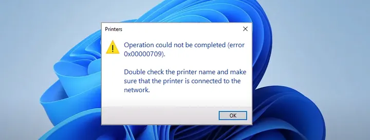 Screenshot pesan Error 0x00000709 saat mencoba menghubungkan printer di Windows 11